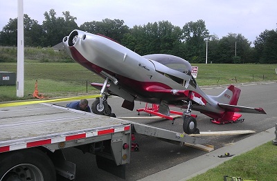 Small airplane prepared for professional ground transportation
